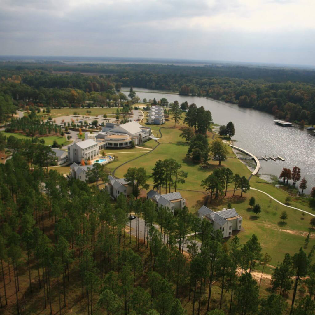 Aerial view of Lake Blackshear Country Club with panoramic views of the surrounding lake and lush greenery.